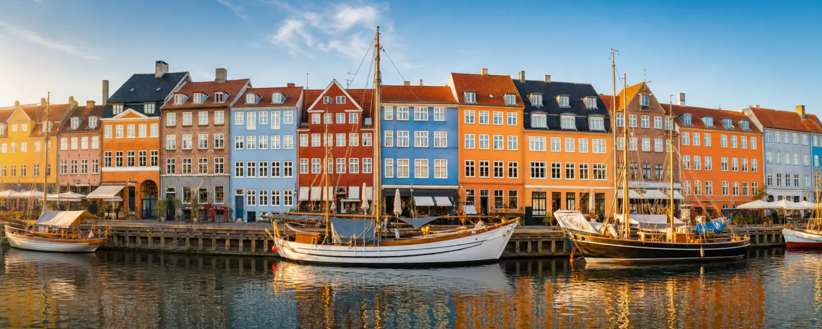 Colorful Nyhavn houses and Copenhagen canal in Denmark
