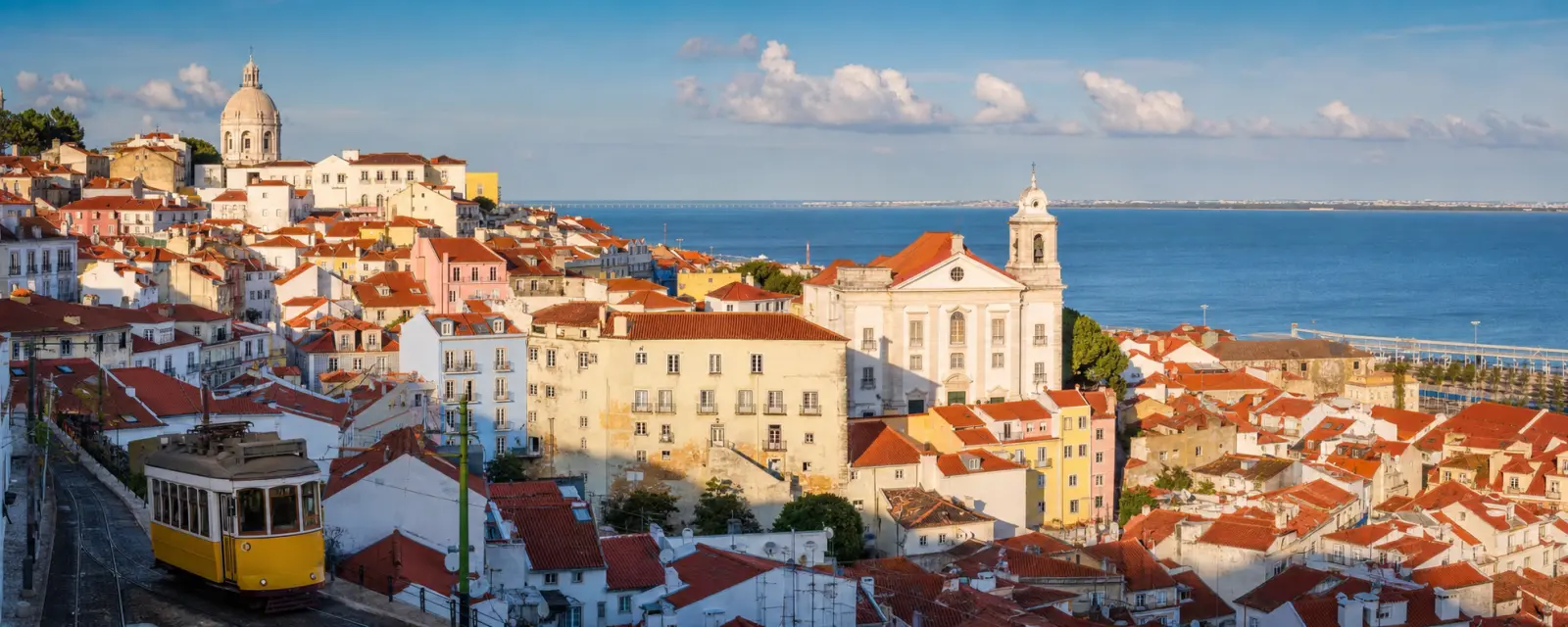 Lisbon, Alfama and a yellow tram in Portugal