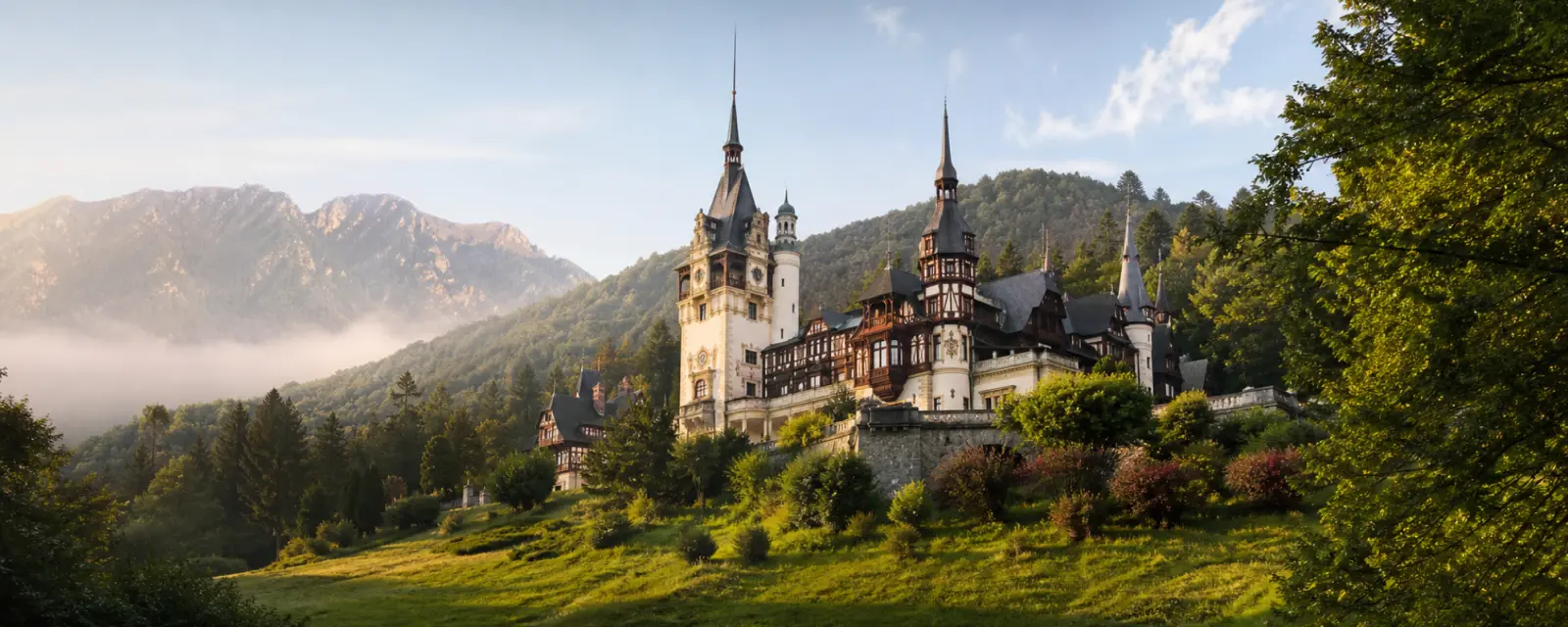 Peles Castle and the Carpathian Mountains in Romania